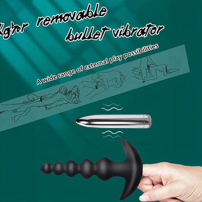 Vibrating anal beads butt plug with removable bullet vibrator.